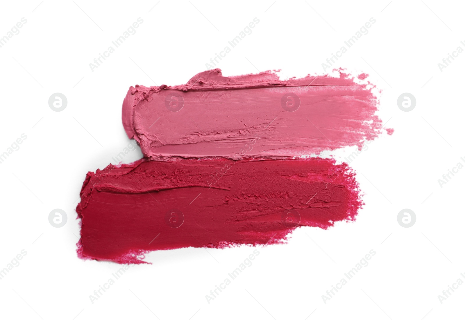 Photo of Smears of beautiful lipsticks on white background, top view