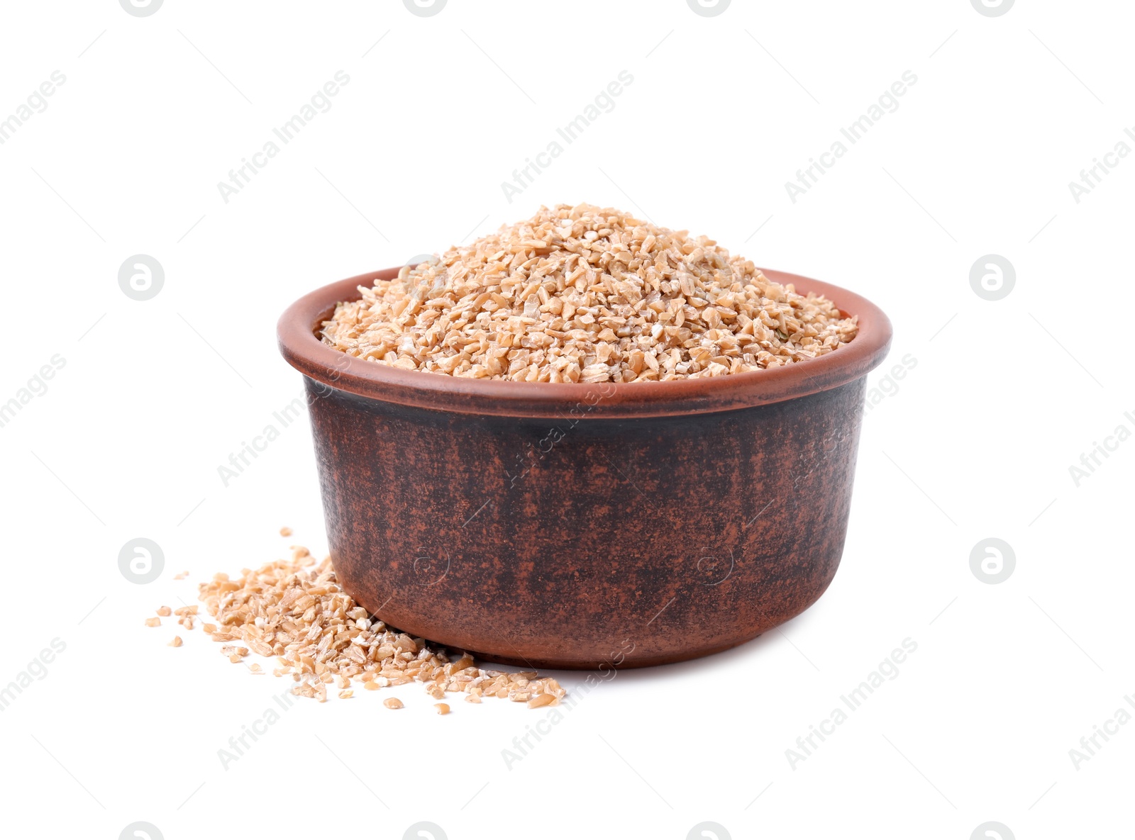 Photo of Dry wheat groats in bowl isolated on white