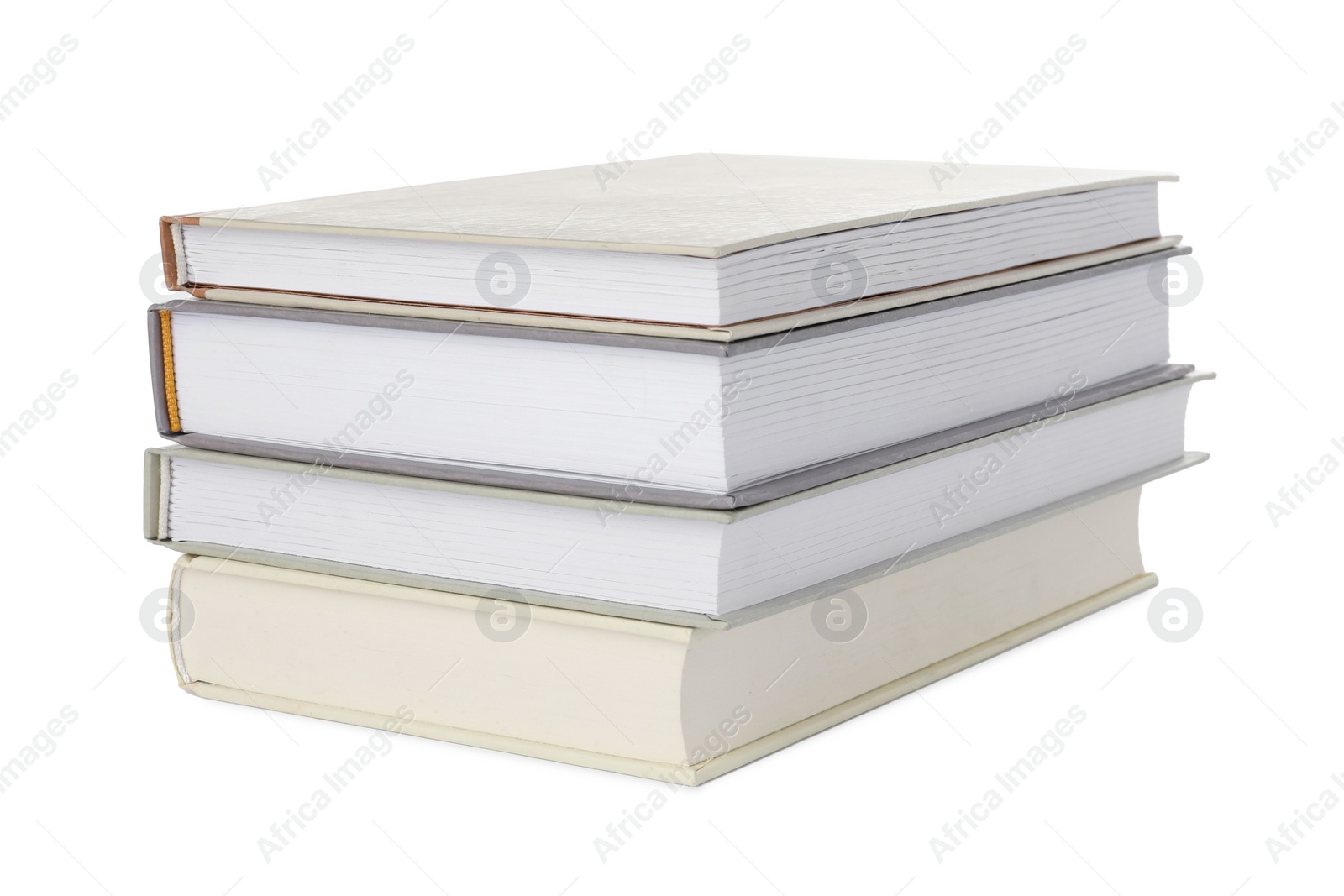 Photo of Many different books stacked on white background