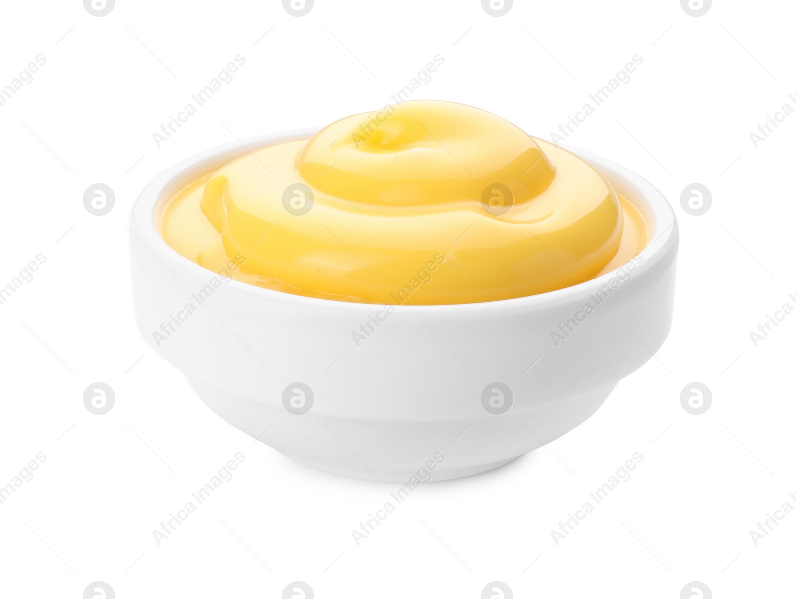 Photo of Delicious cheese sauce in bowl isolated on white
