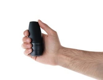 Photo of Man holding roll-on deodorant on white background, closeup