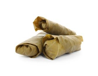 Photo of Delicious stuffed grape leaves on white background