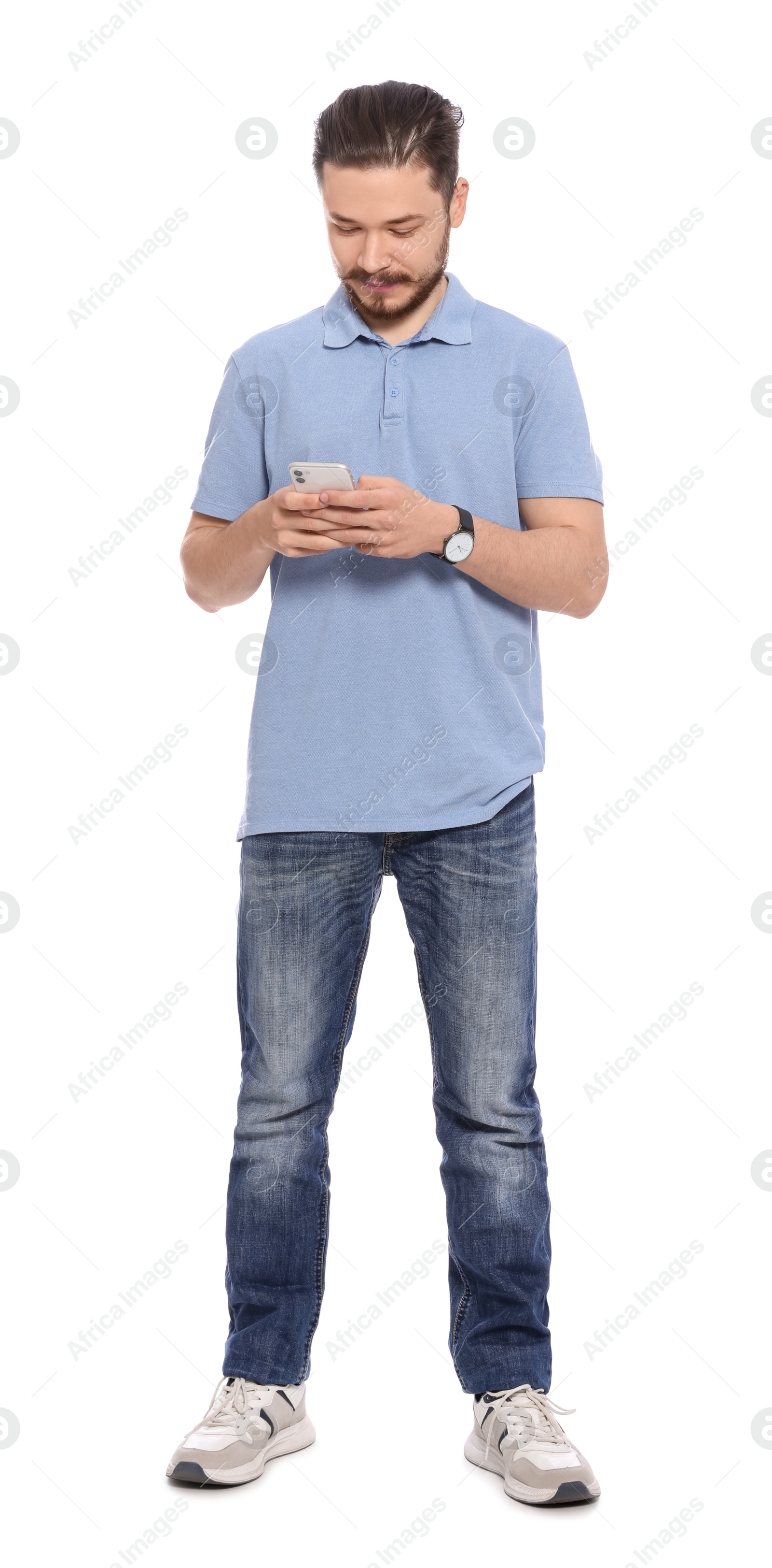 Photo of Handsome man using smartphone on white background