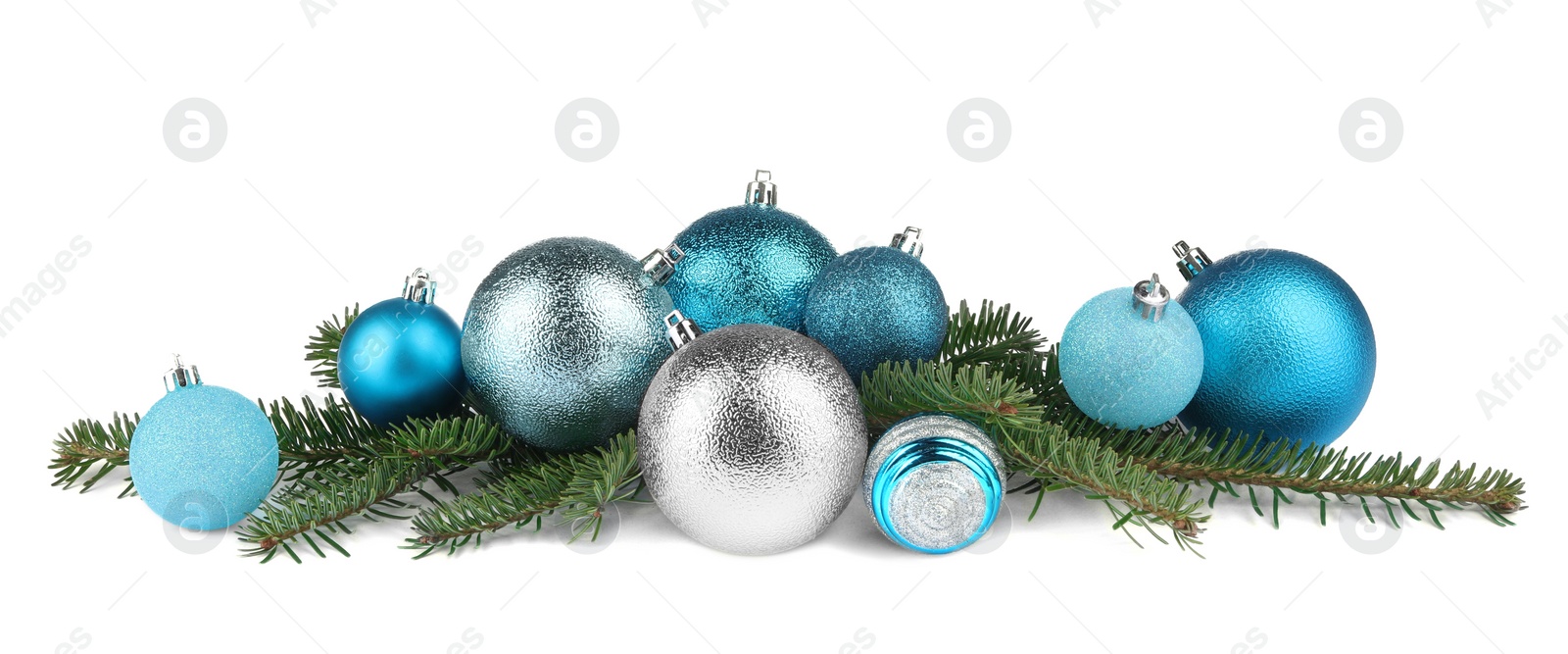 Photo of Beautiful Christmas balls and fir tree branches isolated on white