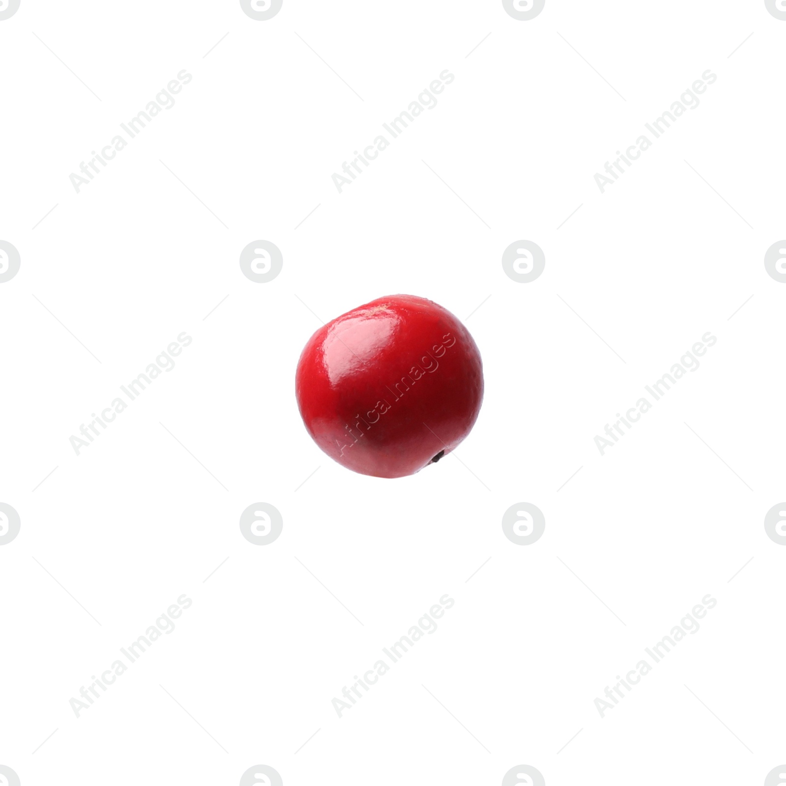 Photo of Aromatic spice. Red peppercorn isolated on white