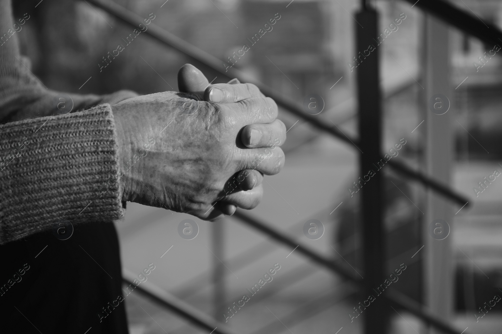 Photo of Closeup of poor senior woman indoors, space for text. Black and white effect
