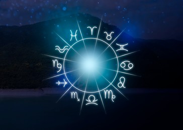 Image of Zodiac wheel with 12 astrological signs and mountain landscape on background