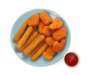 Photo of Tasty chicken nuggets, cheese sticks and ketchup on white background, top view