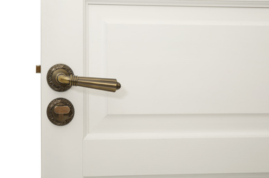 Photo of White door with elegant vintage handle and lock