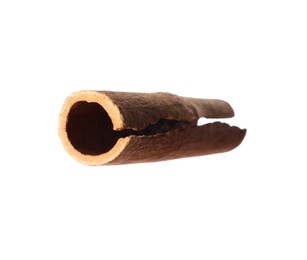 Photo of One aromatic cinnamon stick isolated on white