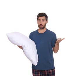 Photo of Surprised handsome man with pillow on white background