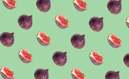 Image of Pattern of cut and whole figs on pale green background