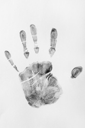 Photo of Print of hand and fingers on white background, top view