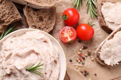 Photo of Delicious lard spread, bread and tomatoes on table, flat lay