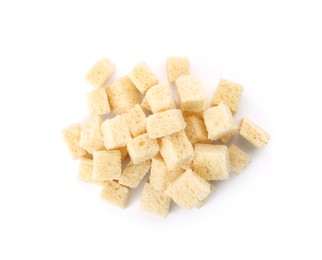 Photo of Heap of crispy croutons on white background, top view