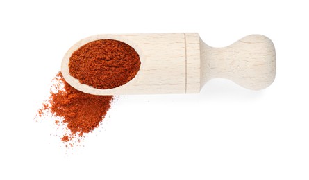 Photo of Scoop of aromatic paprika isolated on white, top view