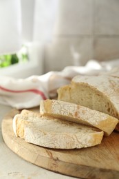 Photo of Freshly baked sourdough bread on light table