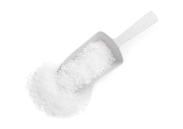 Photo of Natural sea salt and scoop on white background, top view