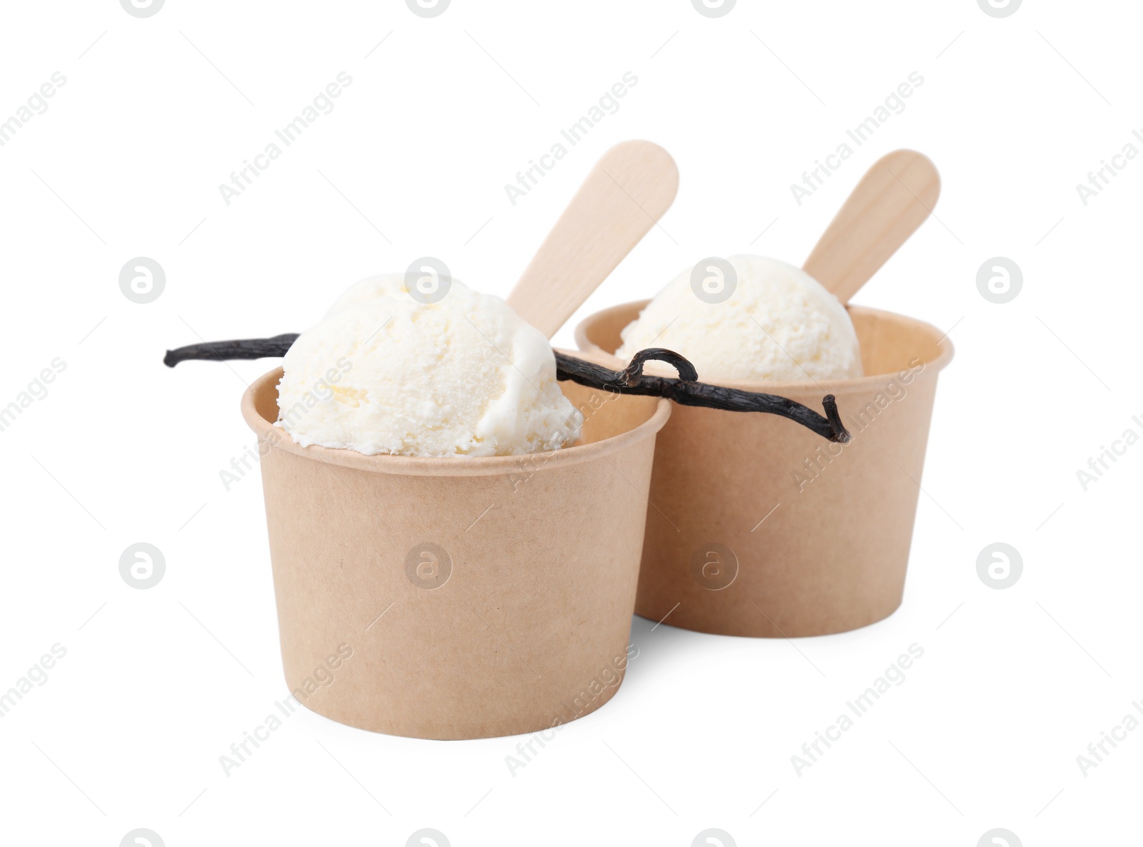 Photo of Paper cups with delicious ice cream and vanilla pod isolated on white