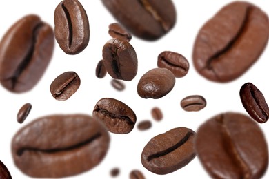 Roasted coffee beans falling o white background