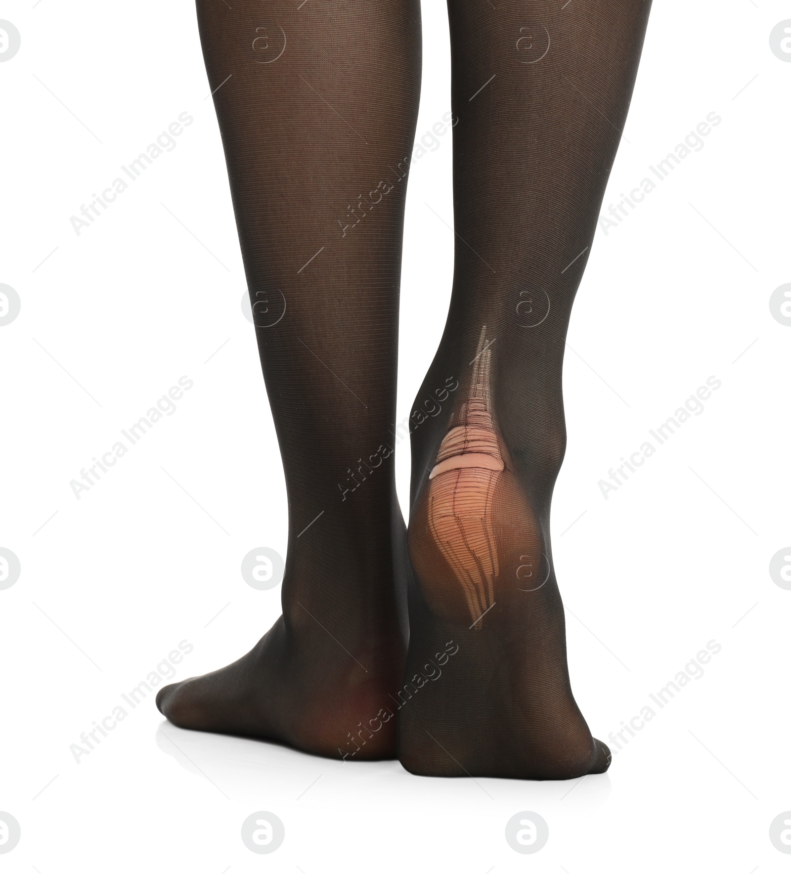 Photo of Woman wearing torn tights on white background, closeup