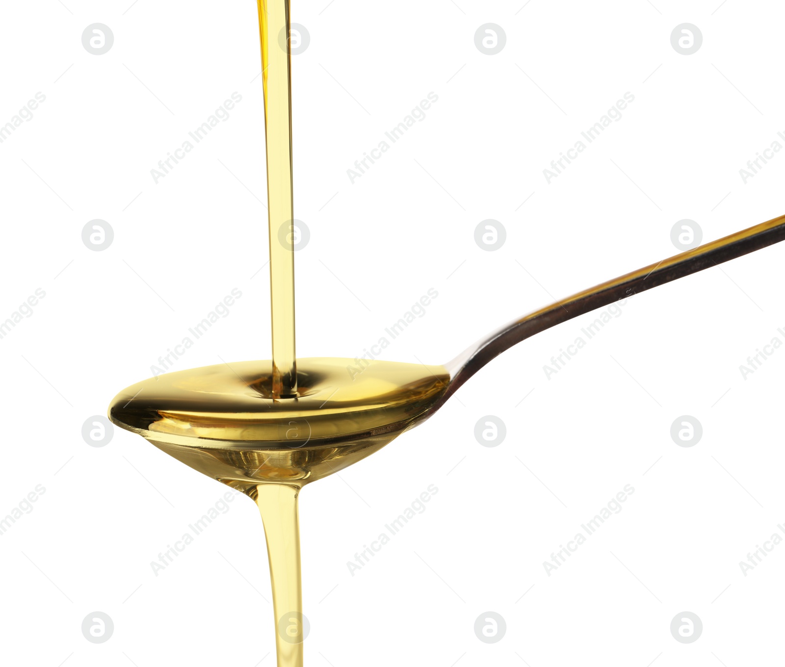 Photo of Pouring cooking oil into spoon on white background