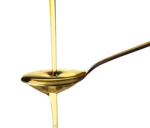 Photo of Pouring cooking oil into spoon on white background