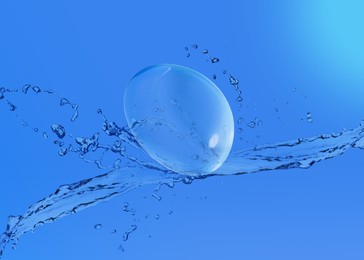 Contact lens and splash of solution on blue background