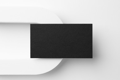 Photo of Blank black business card on white background, top view. Mockup for design