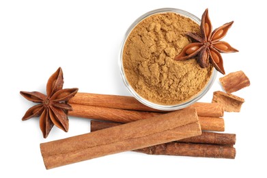 Dry aromatic cinnamon sticks, powder and anise stars isolated on white, top view