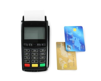 New modern payment terminal and credit cards on white background