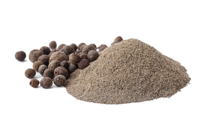 Photo of Spicy milled and whole black pepper isolated on white