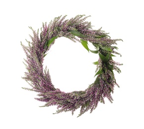 Beautiful autumnal wreath with heather flowers isolated on white