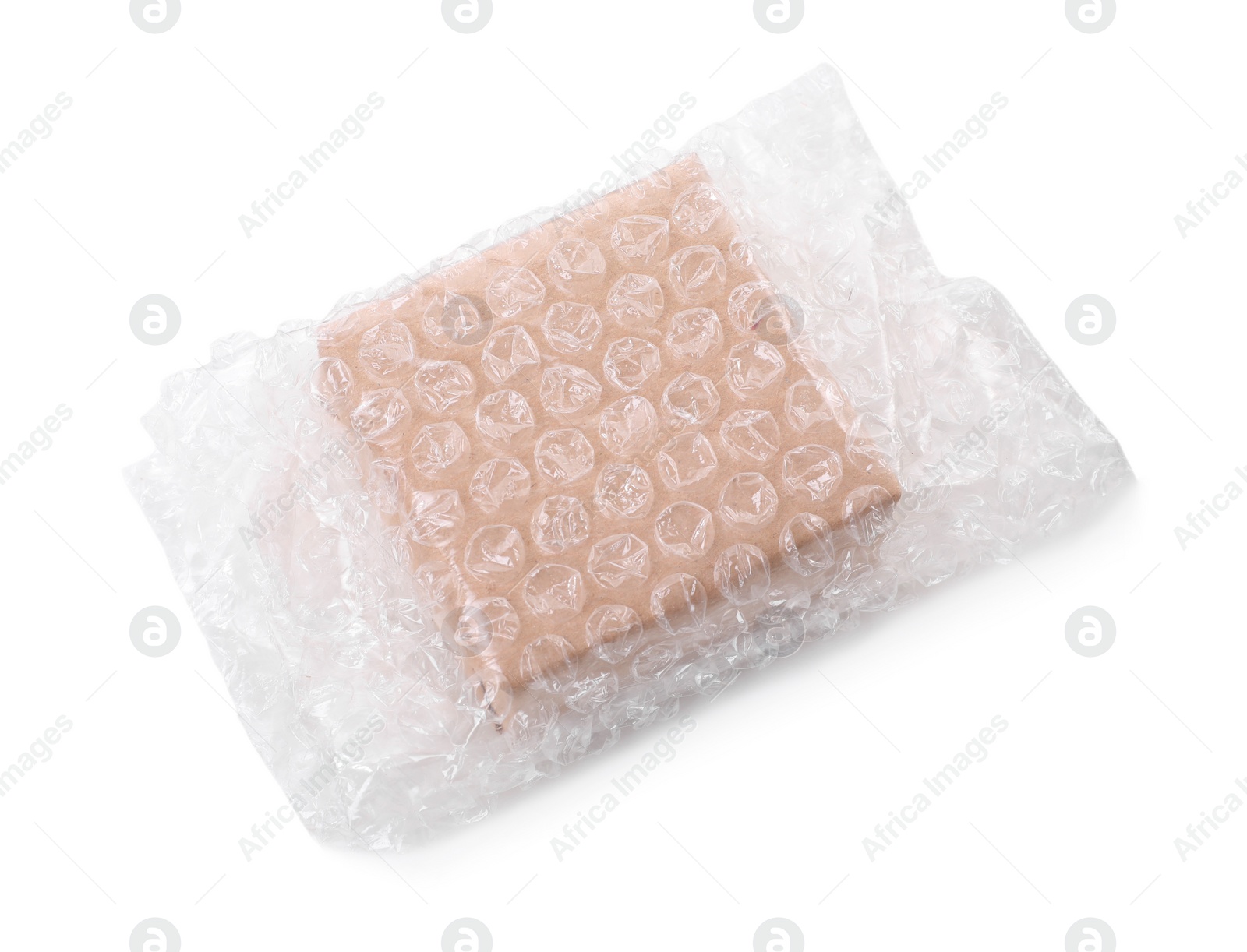 Photo of Cardboard box packed in bubble wrap isolated on white, above view