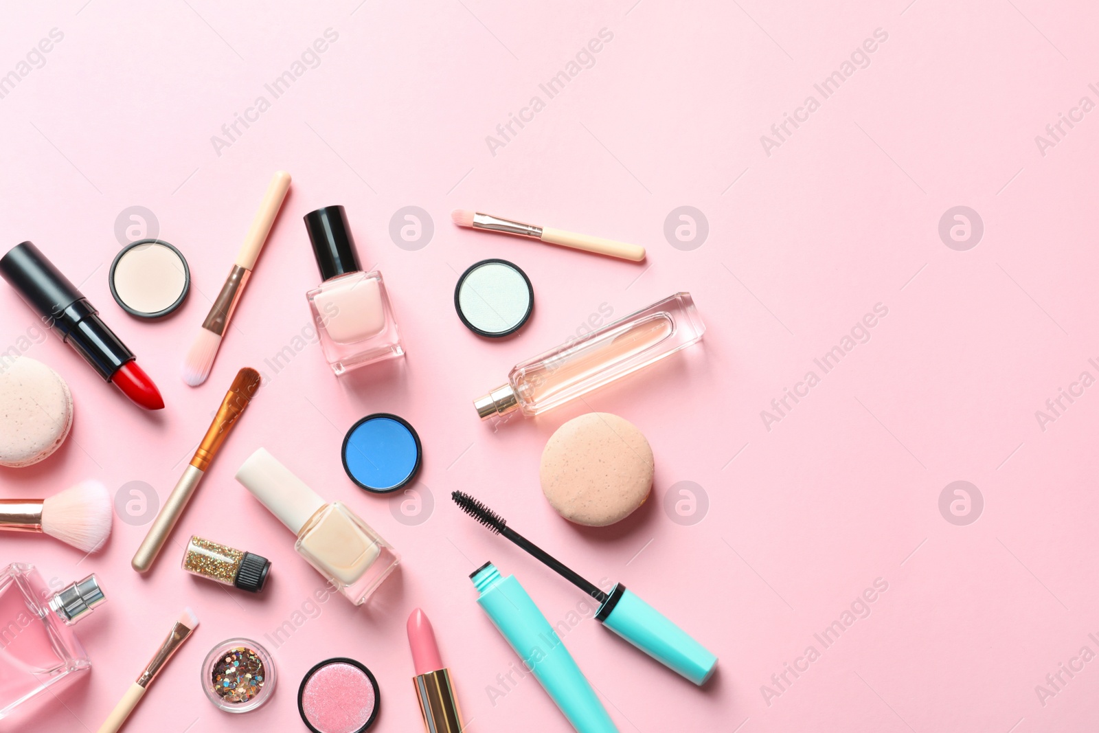 Photo of Flat lay composition with decorative cosmetics on color background