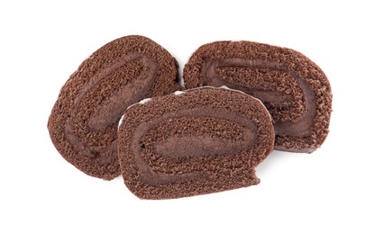 Photo of Slices of tasty chocolate cake roll with cream on white background, top view