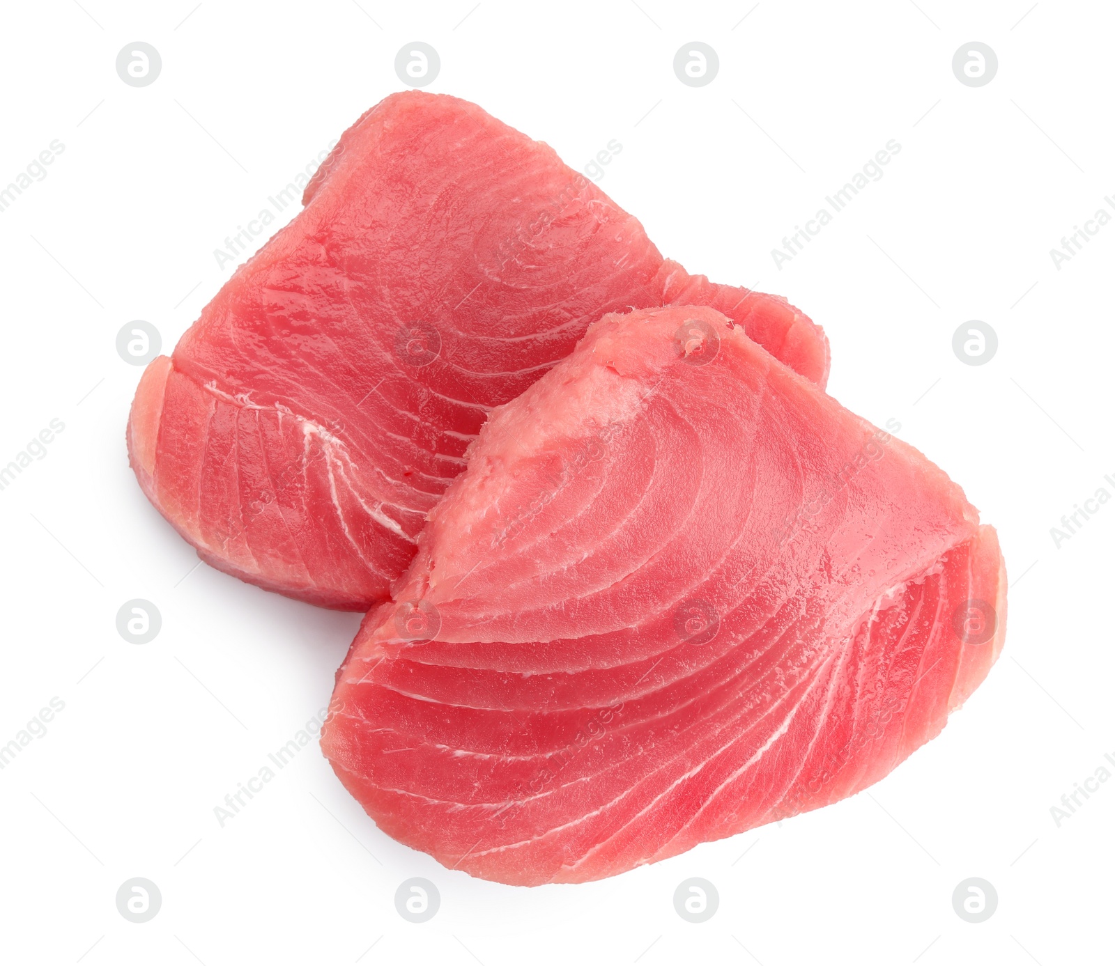 Photo of Two raw tuna fillets on white background, top view