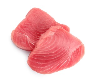 Photo of Two raw tuna fillets on white background, top view