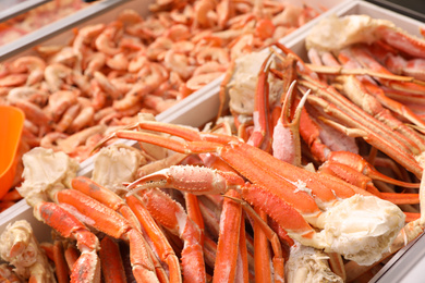 Photo of Fresh pieces of crabs on display. Wholesale market