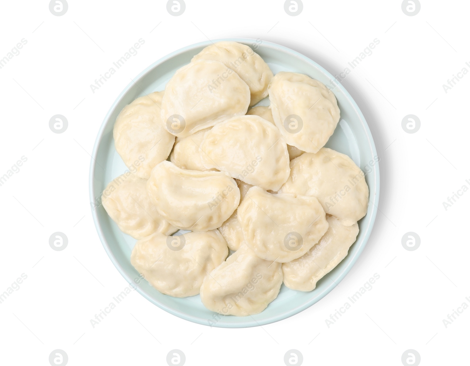 Photo of Plate of delicious dumplings (varenyky) isolated on white, top view