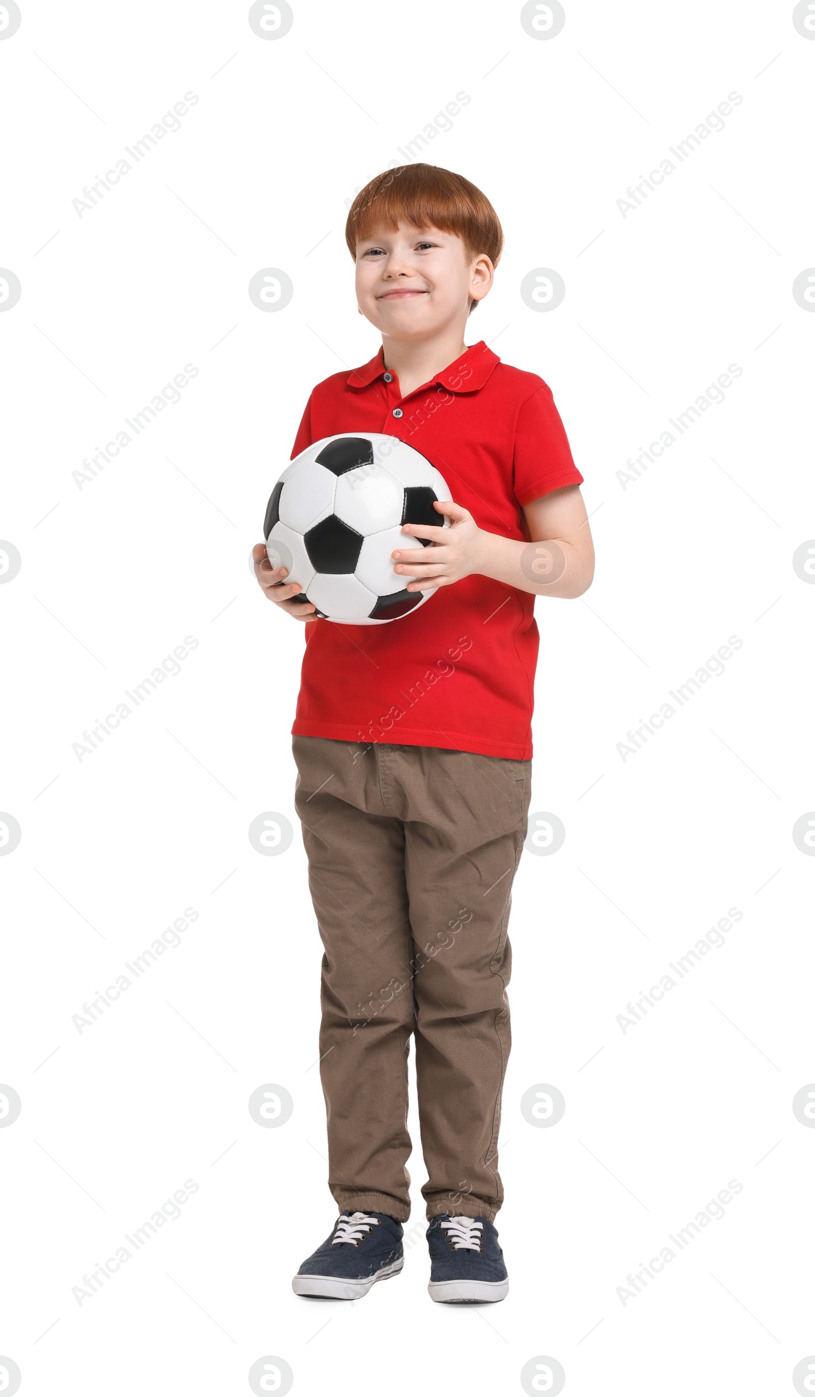Photo of Little boy with soccer ball on white background