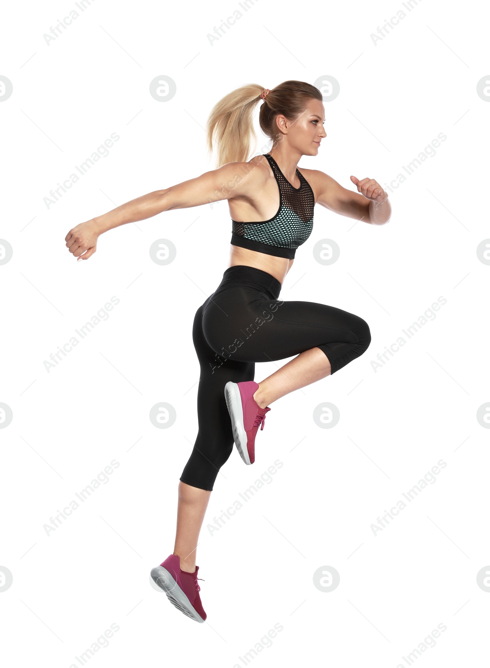 Photo of Sporty young woman running on white background