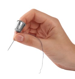 Photo of Woman with thimble, thread and sewing needle on white background, closeup