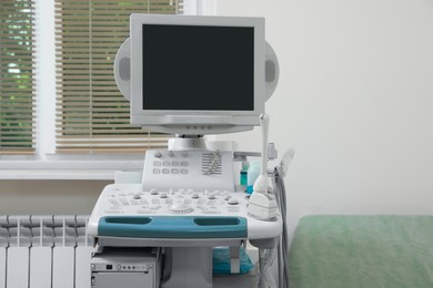 One ultrasound machine near window in hospital