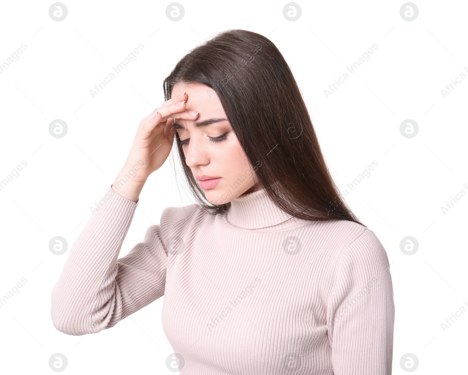 Photo of Young woman suffering from headache on white background