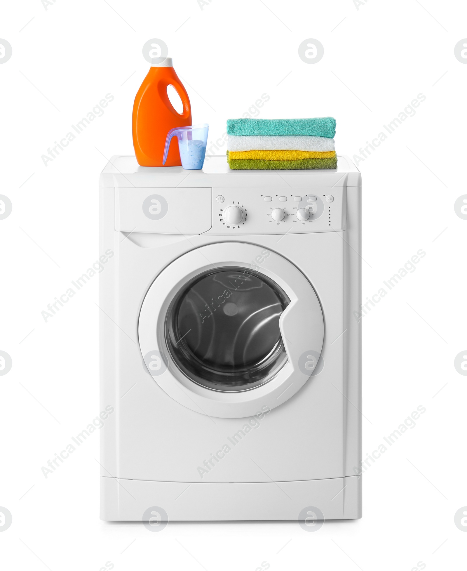 Photo of Modern washing machine, stack of towels and detergents on white background. Laundry day