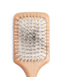 Photo of Wooden brush with lost hair on white background, top view
