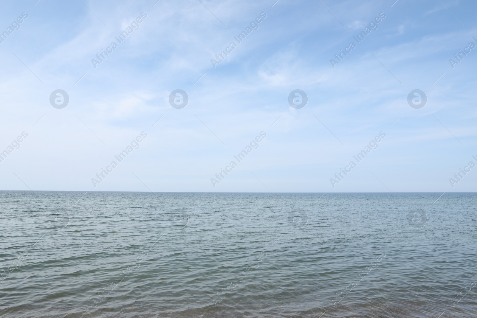 Photo of Picturesque view of blue sky and sea. Tropical beach