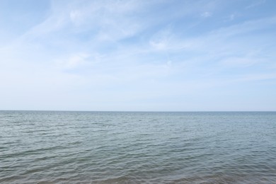 Photo of Picturesque view of blue sky and sea. Tropical beach