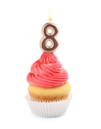 Birthday cupcake with number eight candle on white background